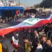 آماده شدن عراقی‌ها برای تظاهرات جلوی سفارت آمریکا در بغداد