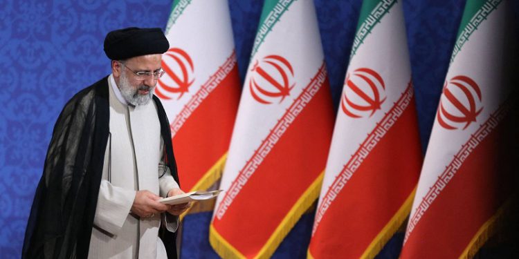 TOPSHOT - Iran's President-elect Ebrahim Raisi is pictured during his first press conference in the Islamic republic's capital Tehran, on June 21, 2021. - Iran's new president hailed what he called a 'massive' voter turnout during last week's presidential election. The ultraconservative cleric was declared the winner of the election on the weekend, replacing moderate Hassan Rouhani. (Photo by ATTA KENARE / AFP)