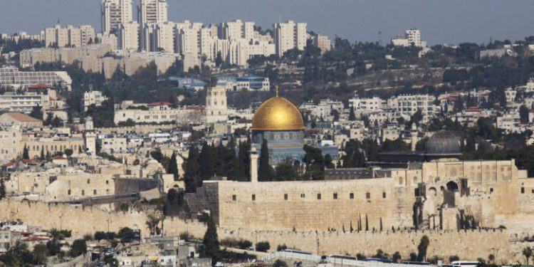 FILE - In this Thursday, Nov. 20, 2014 file photo, the Dome of the Rock Mosque in the Al Aqsa Mosque compound is seen in Jerusalem's old city. France sees a window of opportunity after Israels elections to get the United States on board with a new push for Mideast peace, and is preparing to present a draft U.N Security Council resolution in about 12 days, according to French diplomatic officials. The draft would define the pre-1967 frontier as a reference point for border talks but allow room for exchanges of territory, designate Jerusalem as a capital of two states and call for a fair solution for Palestinian refugees, one official told The Associated Press on Tuesday. (AP Photo/Sebastian Scheiner, File)
