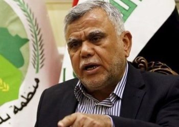 عامری: لە بەرامبەر مانەوەی هێزەکانی ئەمریکا لە عێراق بێدەنگ نابین