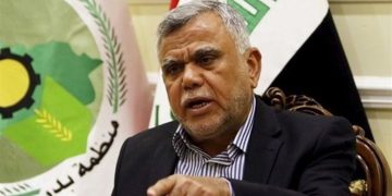 عامری: لە بەرامبەر مانەوەی هێزەکانی ئەمریکا لە عێراق بێدەنگ نابین